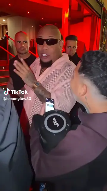 Pink jacket, dark shades