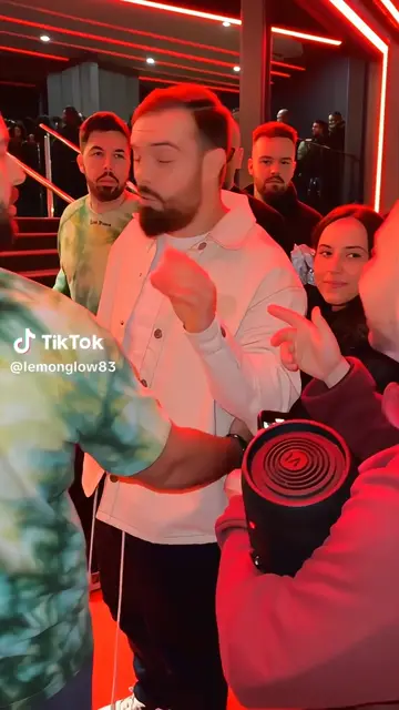 A fan under the red lights
